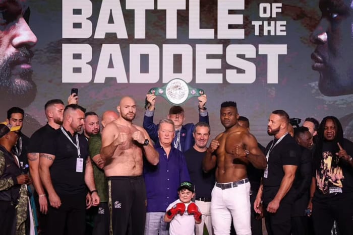 Tyson Fury and Francis Ngannou pose for the media ahead of their October 28 boxing showdown in Saudi Arabia.